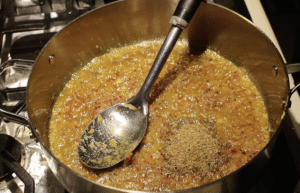 Ground spice powder in the cooking pot
